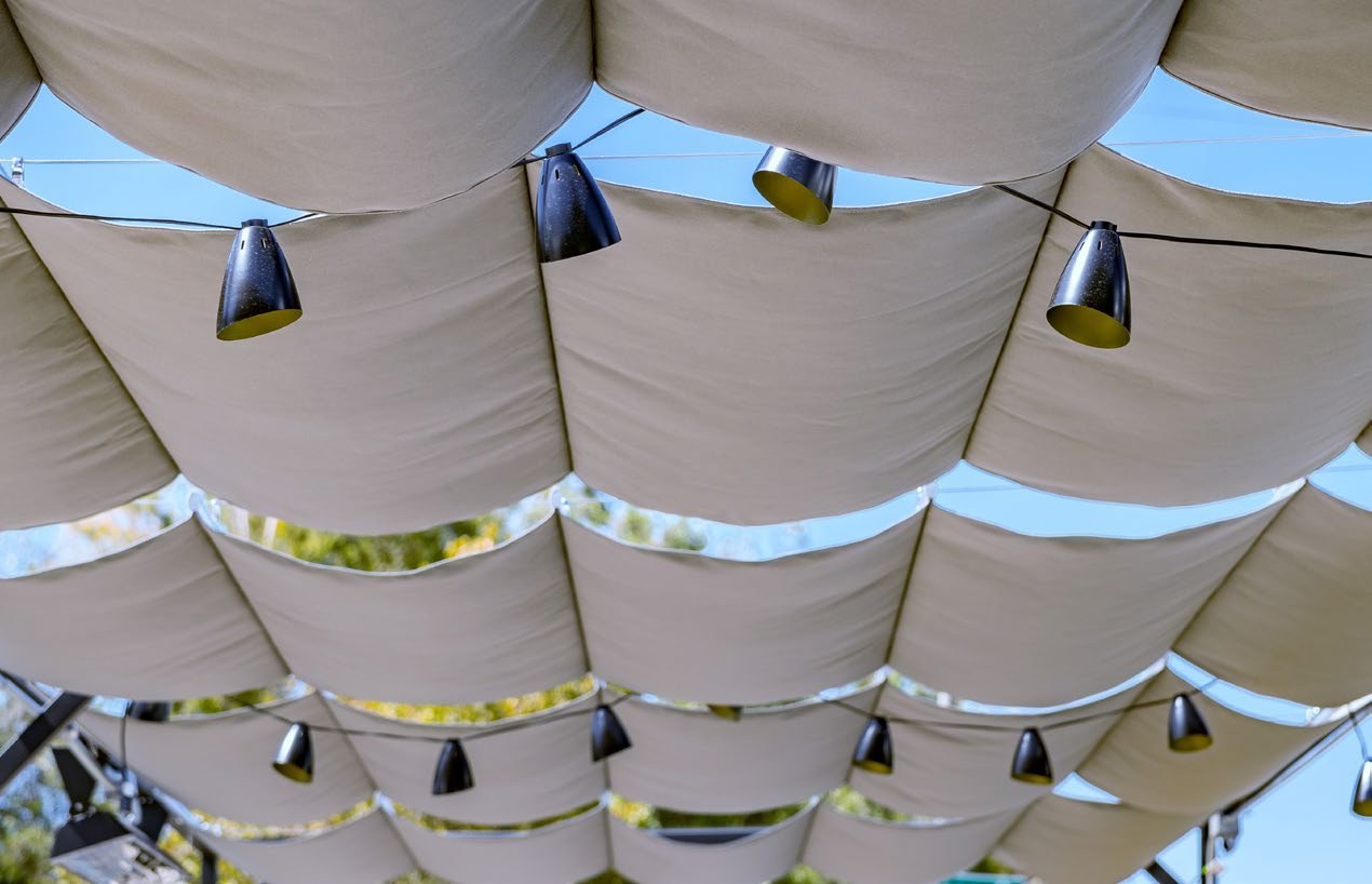 Detail of fabric canopy panels on support wires